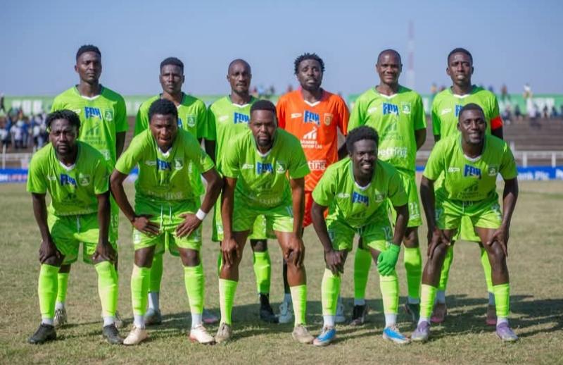 Lime kit line-up: The squad poses before kick-off in the lime kit.